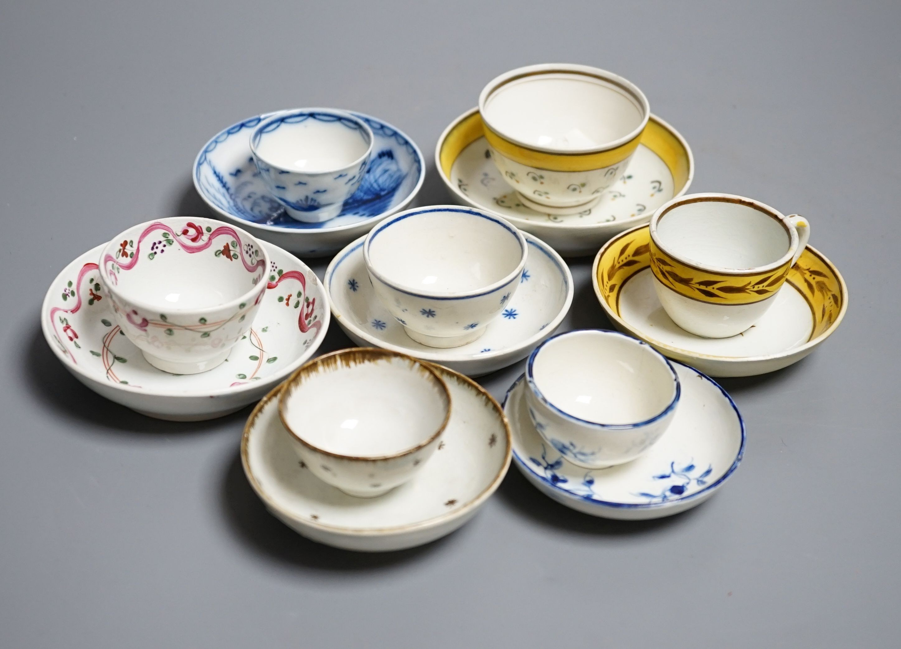 Six pearlware miniature tea bowls and saucers, c.1790-1800 and a similar cup and saucer, c.1810. Provenance - Mona Sattin collection of miniature cups and saucers, collection no.s 273, 276, 281-285.